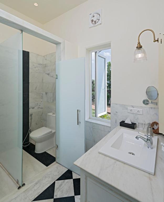 Koupelna v ubytování Sariska Manor Luxury Cottages Tehla