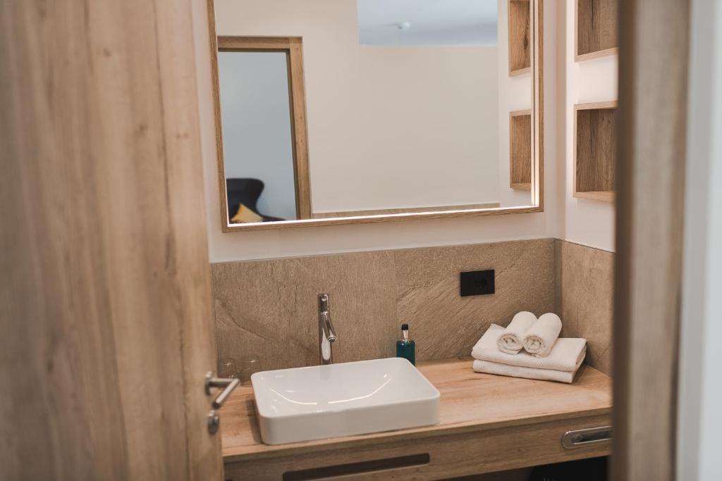 Koupelna v ubytování Hotel Mandelhof