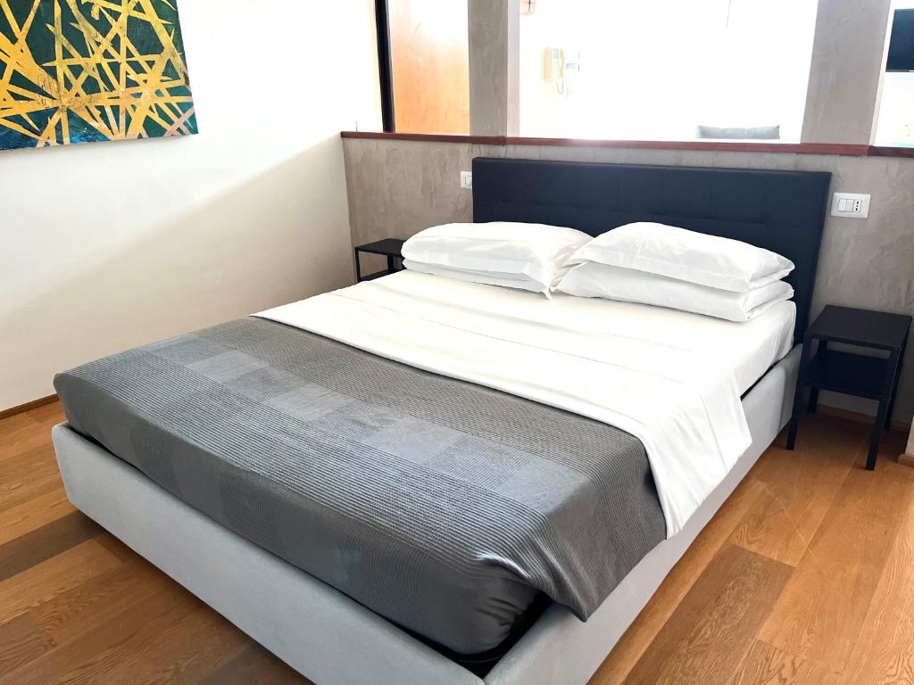 Letto o letti in una camera di Oderisi Studio Suite