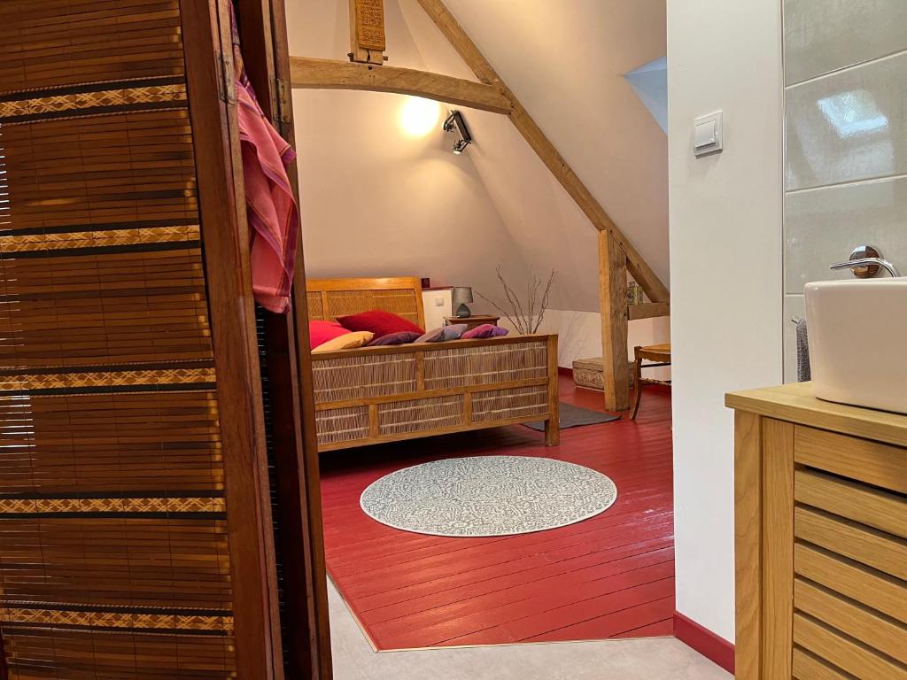 Postel nebo postele na pokoji v ubytování Le Moulin Sainte Marie, chambres d'hôtes et Gîte