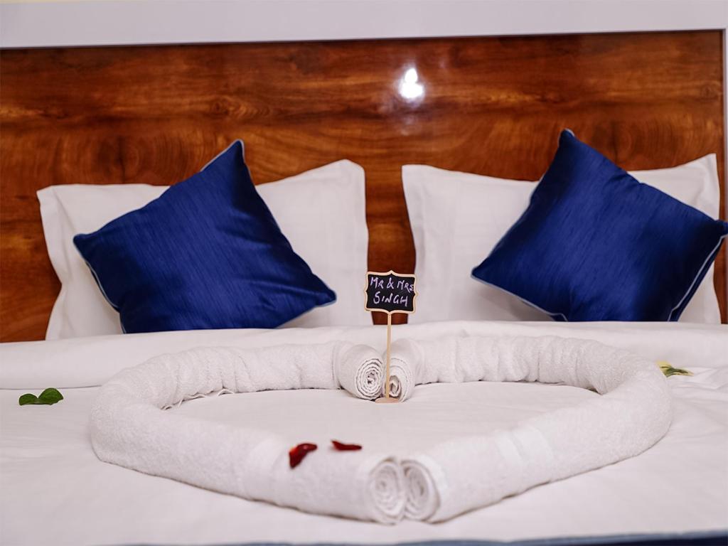 Postel nebo postele na pokoji v ubytování Divine Hills Mashobra