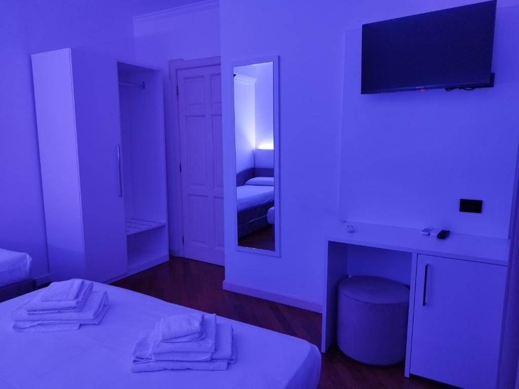 Postel nebo postele na pokoji v ubytování White House