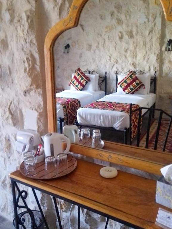 Postel nebo postele na pokoji v ubytování Infinity Lodge