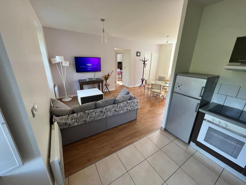 Kuchyň nebo kuchyňský kout v ubytování Charmant appartement RDC familial ou pour le travail