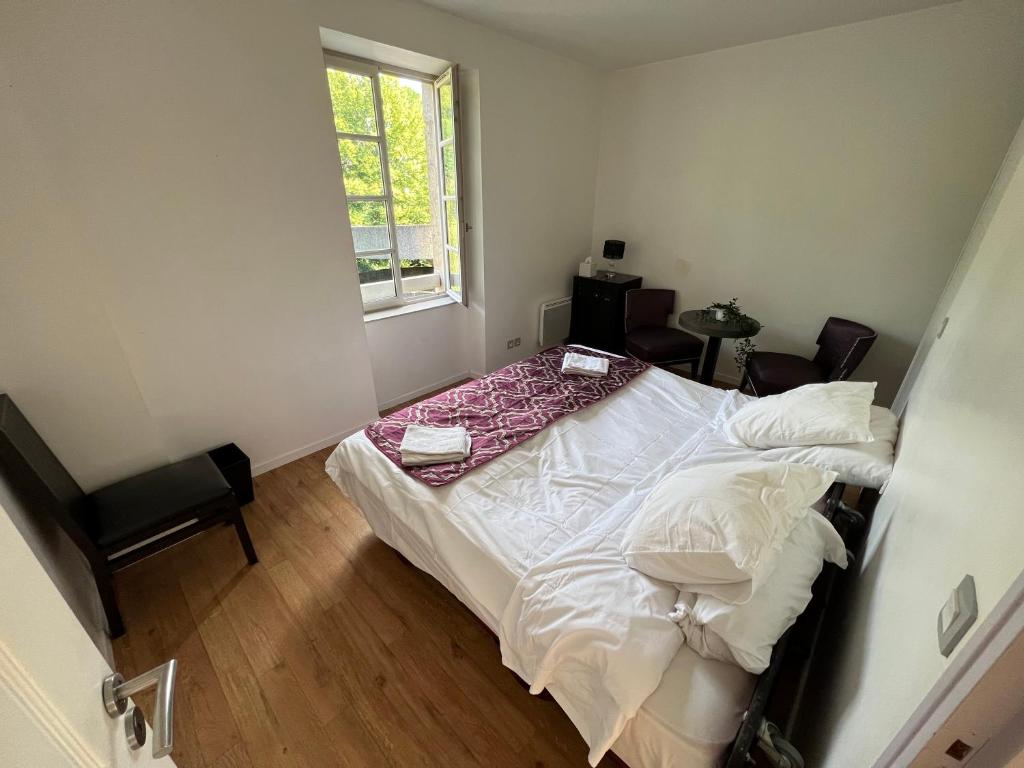 Postel nebo postele na pokoji v ubytování Charmant appartement RDC familial ou pour le travail