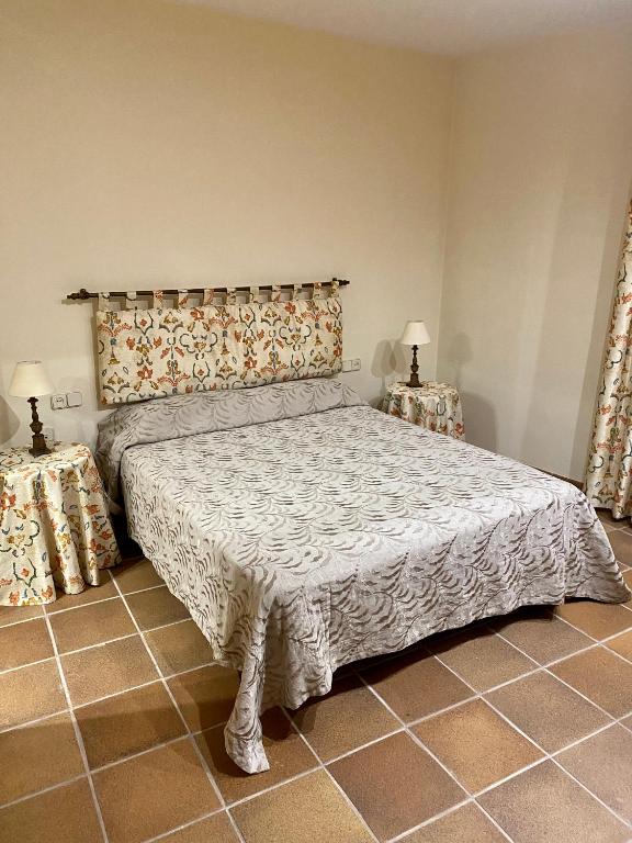 Postel nebo postele na pokoji v ubytování Cal Cuaresma