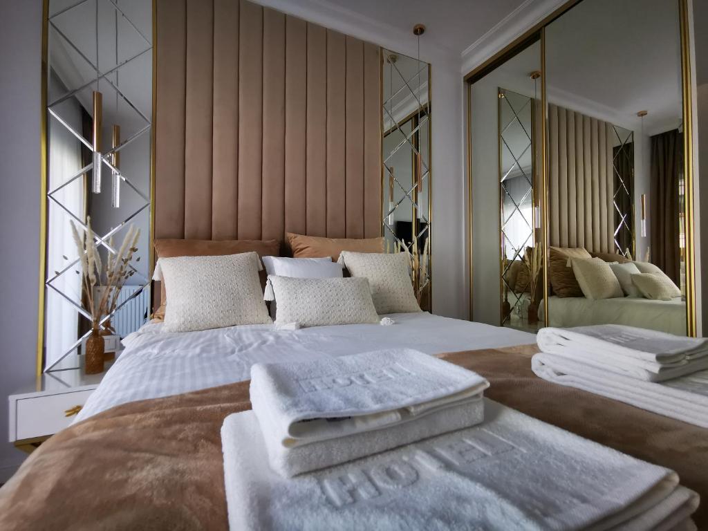 Posteľ alebo postele v izbe v ubytovaní Gold Apartment B29 Let's Sea Baltic Park Gąski