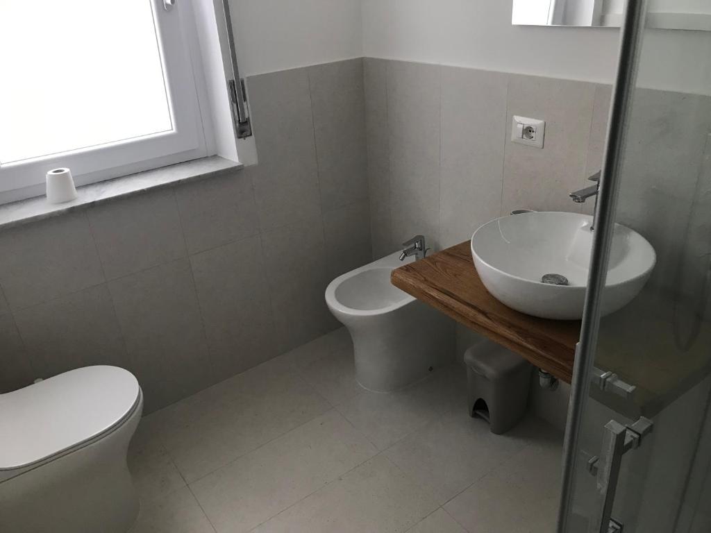Koupelna v ubytování Latomia del Paradiso chambres et vacances