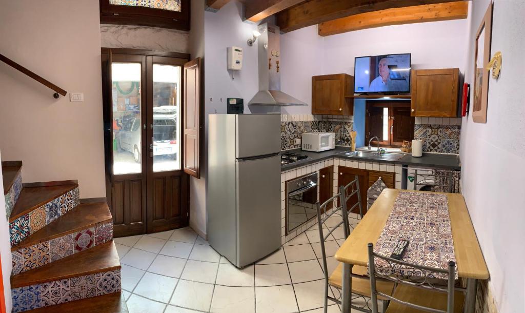 Kuchyňa alebo kuchynka v ubytovaní La casa di “Nedda”