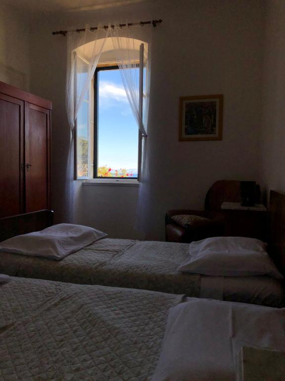 Postel nebo postele na pokoji v ubytování Apartment Marasovic