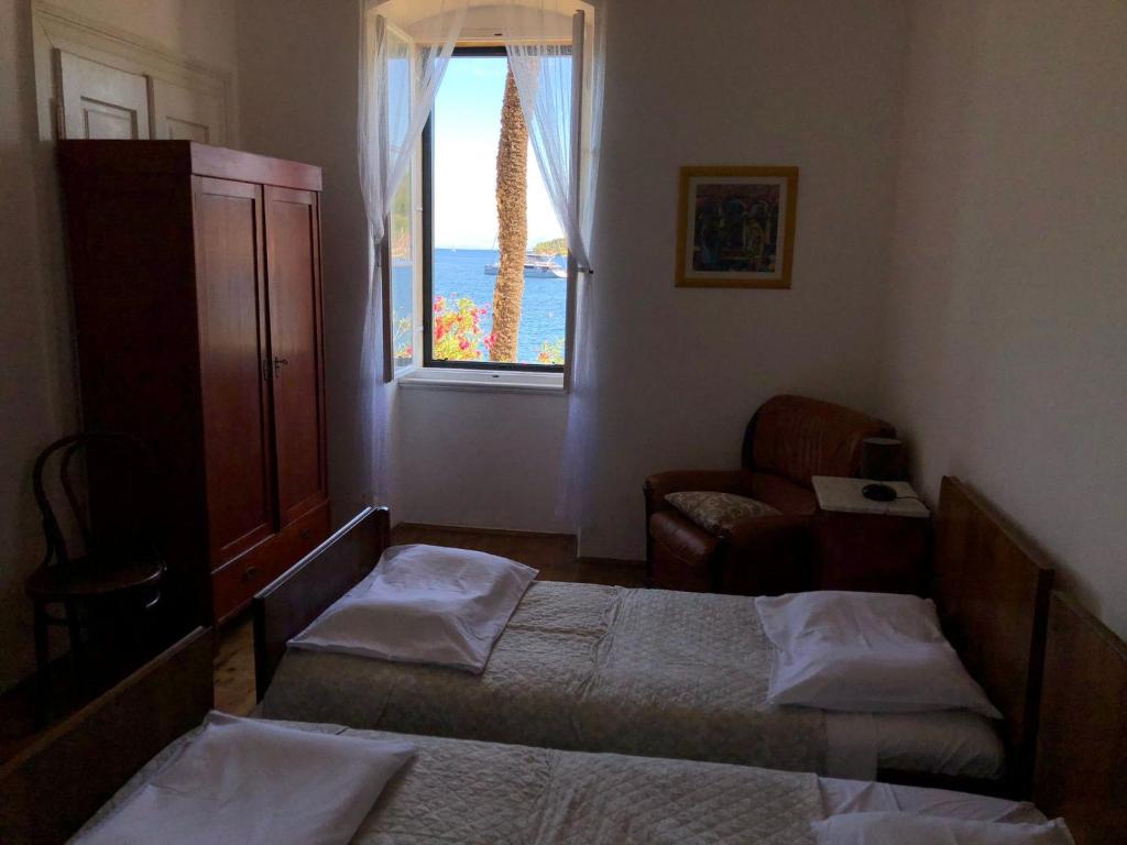 Postel nebo postele na pokoji v ubytování Apartment Marasovic