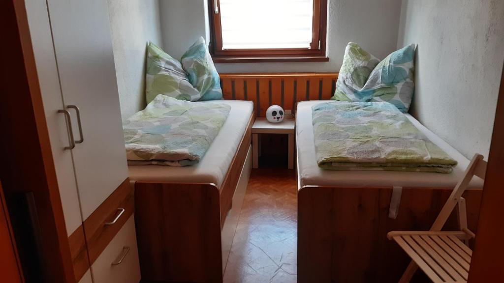 Postel nebo postele na pokoji v ubytování Apartment Eva