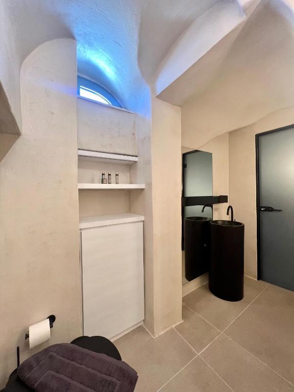 Kuchyň nebo kuchyňský kout v ubytování ArmonOia Suites