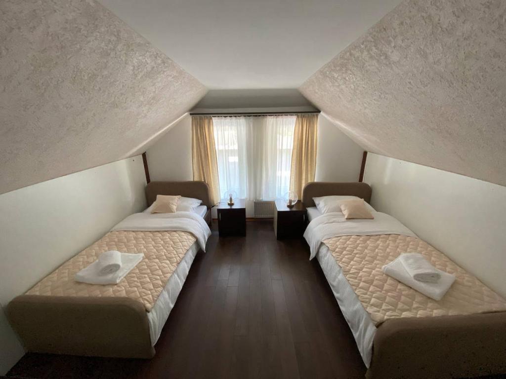 Letto o letti in una camera di Podrinjski san