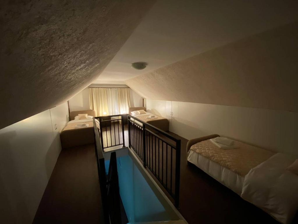 Letto o letti in una camera di Podrinjski san