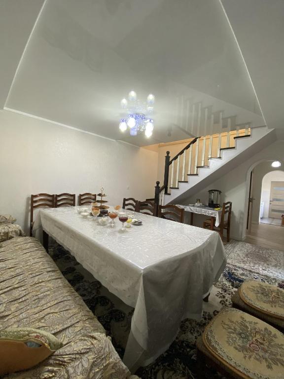 Postel nebo postele na pokoji v ubytování Guest House Tenir Too