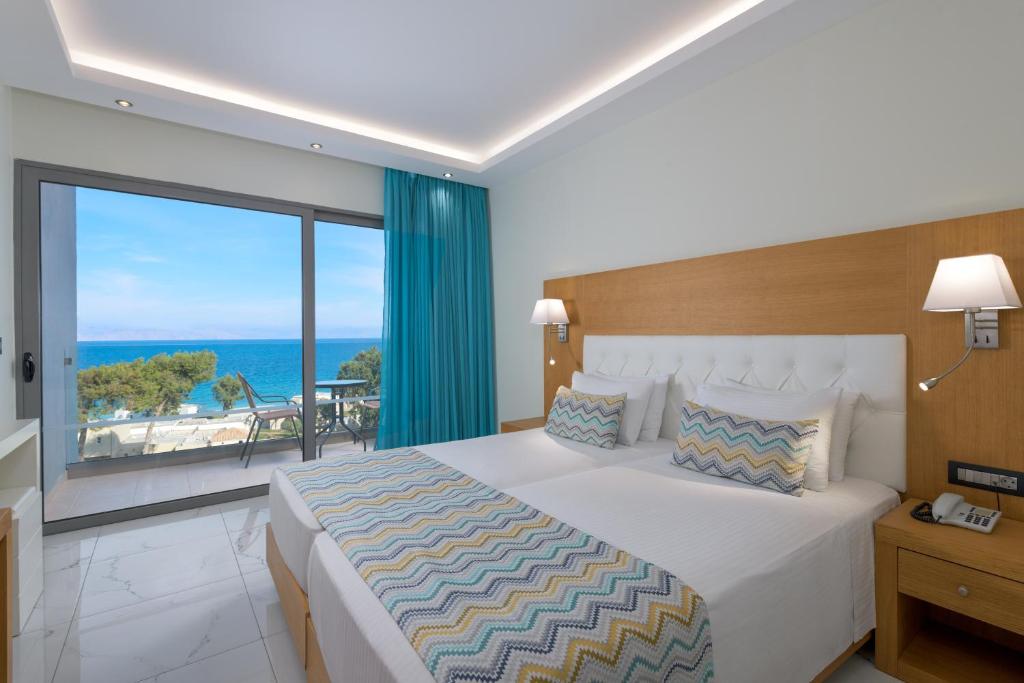 Voodi või voodid majutusasutuse Oceanis Park Hotel toas