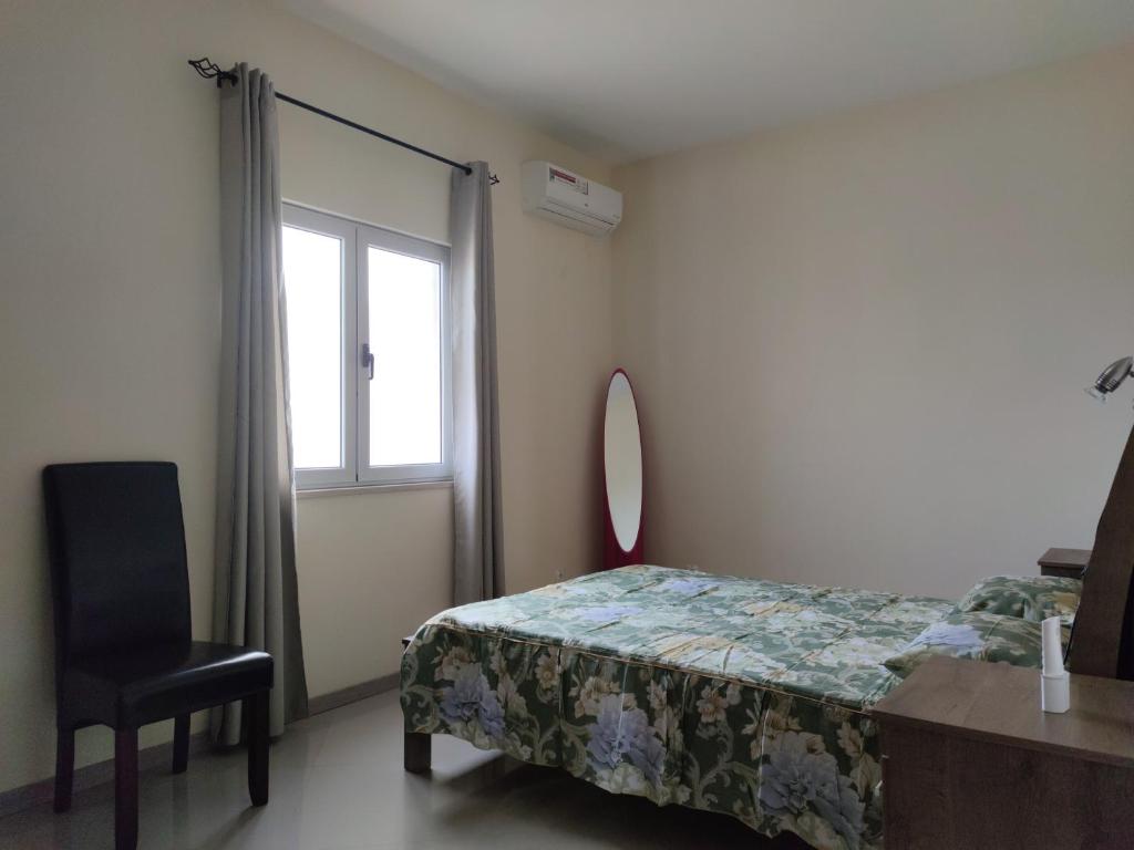Postel nebo postele na pokoji v ubytování Praia Capital Residence Aparthotel