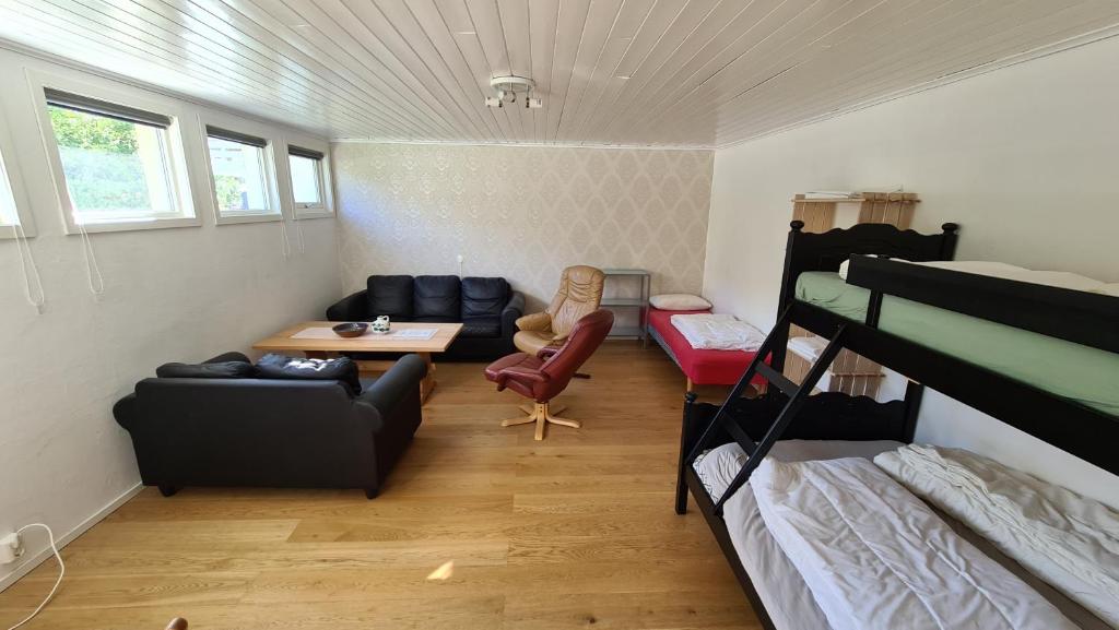 Postel nebo postele na pokoji v ubytování Trolltunga Lodge