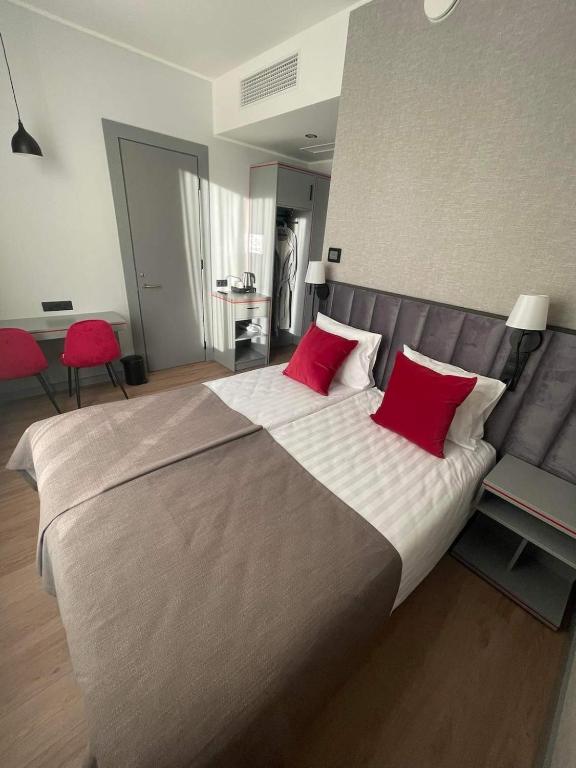 Postel nebo postele na pokoji v ubytování Tõrva Veemõnula Spaahotell