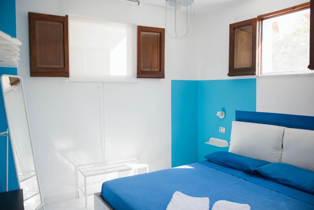 Postel nebo postele na pokoji v ubytování Casa aMmare