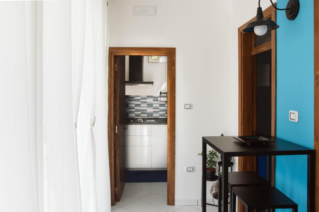 Kuchyň nebo kuchyňský kout v ubytování Casa aMmare