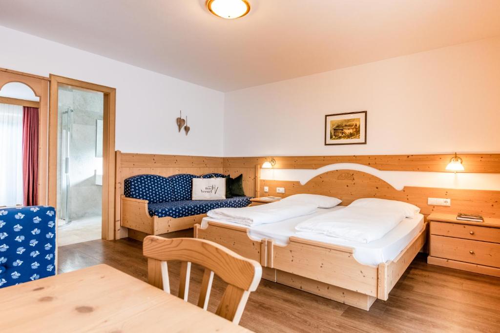 Posteľ alebo postele v izbe v ubytovaní Hotel Vernel