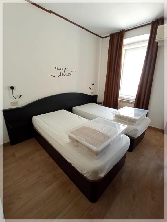 Postel nebo postele na pokoji v ubytování Hotel Istria