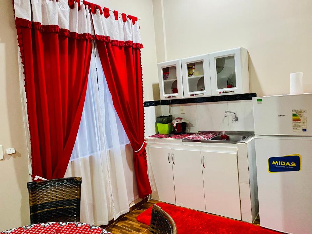 Kuchyň nebo kuchyňský kout v ubytování SV Apart Hotel