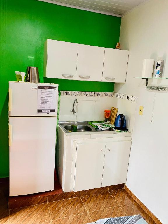 Kuchyň nebo kuchyňský kout v ubytování SV Apart Hotel