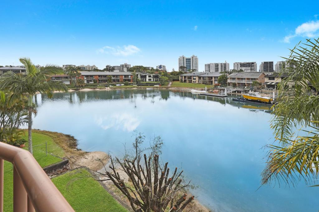 a large body of water with buildings in the background at CANAL7-ON THE MOOLOOLABA CANAL! in Mooloolaba