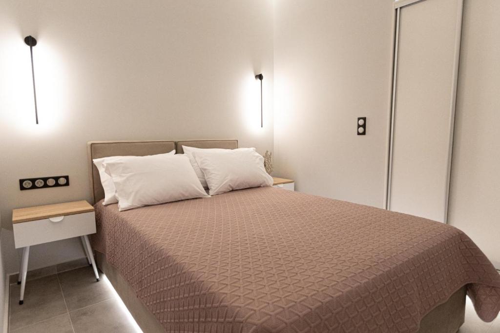 Postel nebo postele na pokoji v ubytování BillMar Luxury Apartment in the center of Gythio