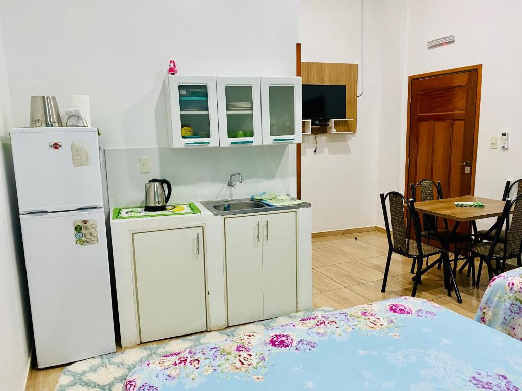 Kuchyň nebo kuchyňský kout v ubytování SV Apart Hotel