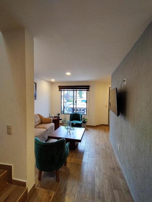 TV a/nebo společenská místnost v ubytování Casa Noriux en Gdl