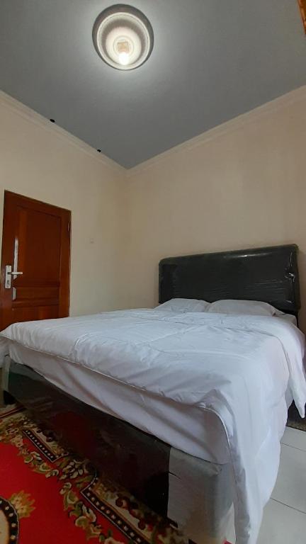 Homestay Merpati Dieng Syariah RedPartner - Salle Familiale