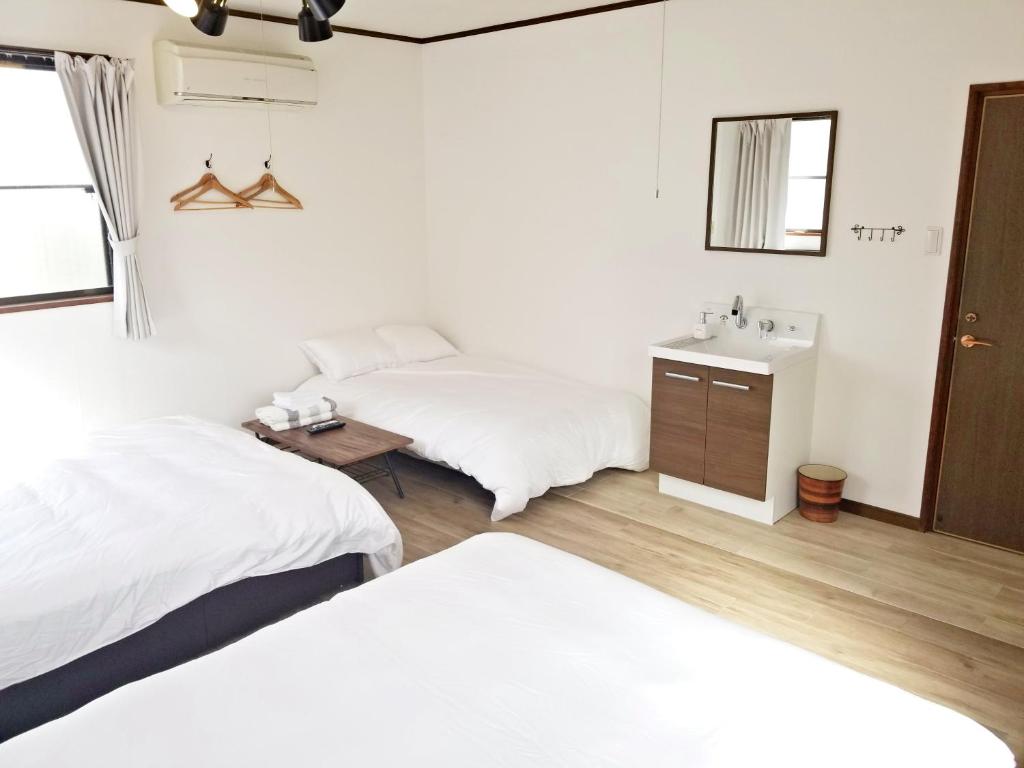 Postel nebo postele na pokoji v ubytování Guest House Tatara