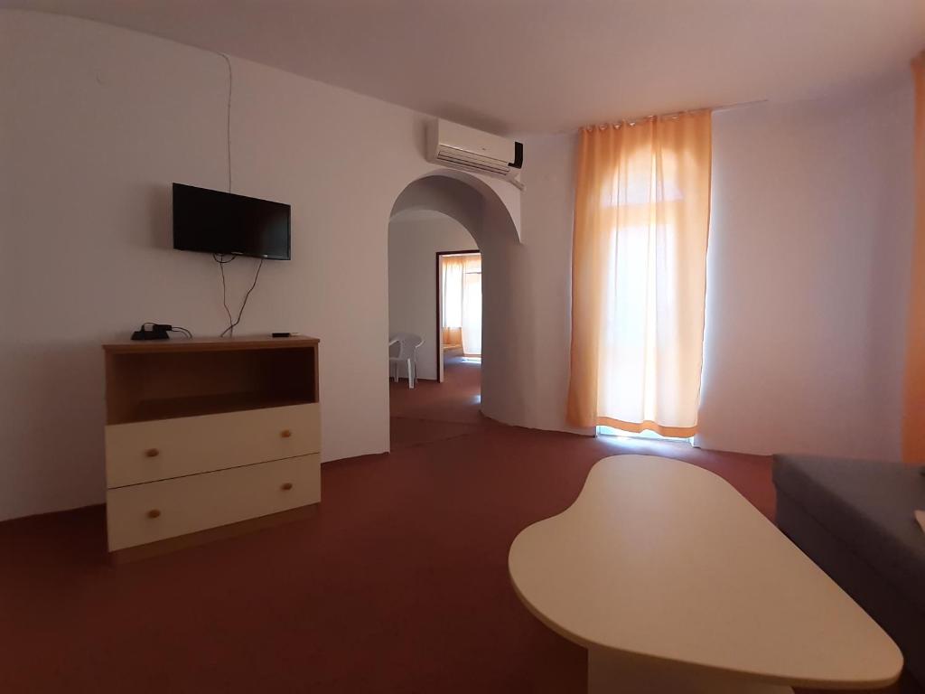TV a/nebo společenská místnost v ubytování Guest House Malkata Stopanka