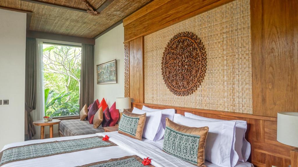 Sakti Garden Resort & Spaにあるベッド