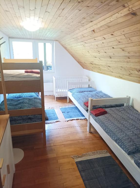 Postel nebo postele na pokoji v ubytování Chalupa U Mohelky