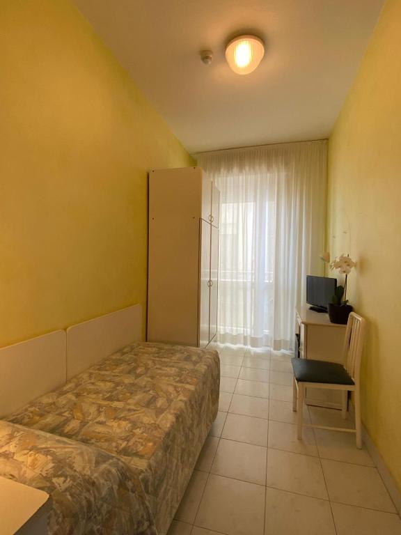 Postel nebo postele na pokoji v ubytování Hotel Eden
