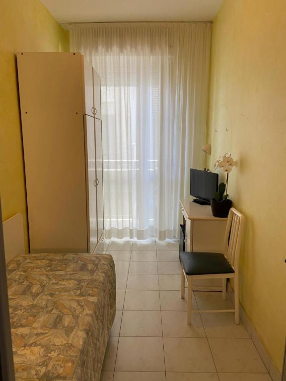 TV a/nebo společenská místnost v ubytování Hotel Eden