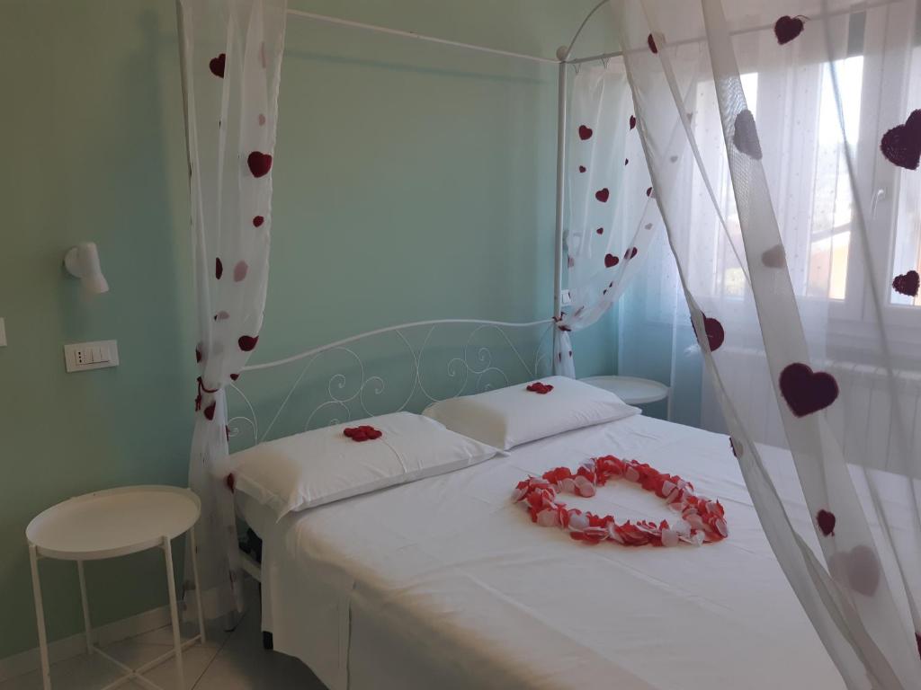 Postel nebo postele na pokoji v ubytování Nonna Anita Palace Narni