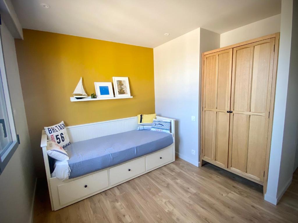Łóżko lub łóżka w pokoju w obiekcie La Bellevue Bistrot et Chambres d'Hotes