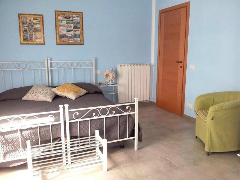 Postel nebo postele na pokoji v ubytování Nonna Anita Palace Narni