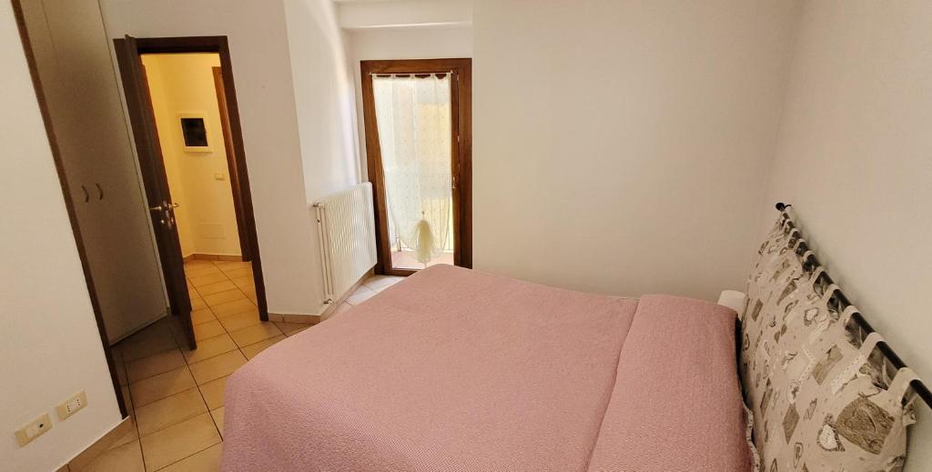 Postel nebo postele na pokoji v ubytování Lovely apartment in center of Barzio