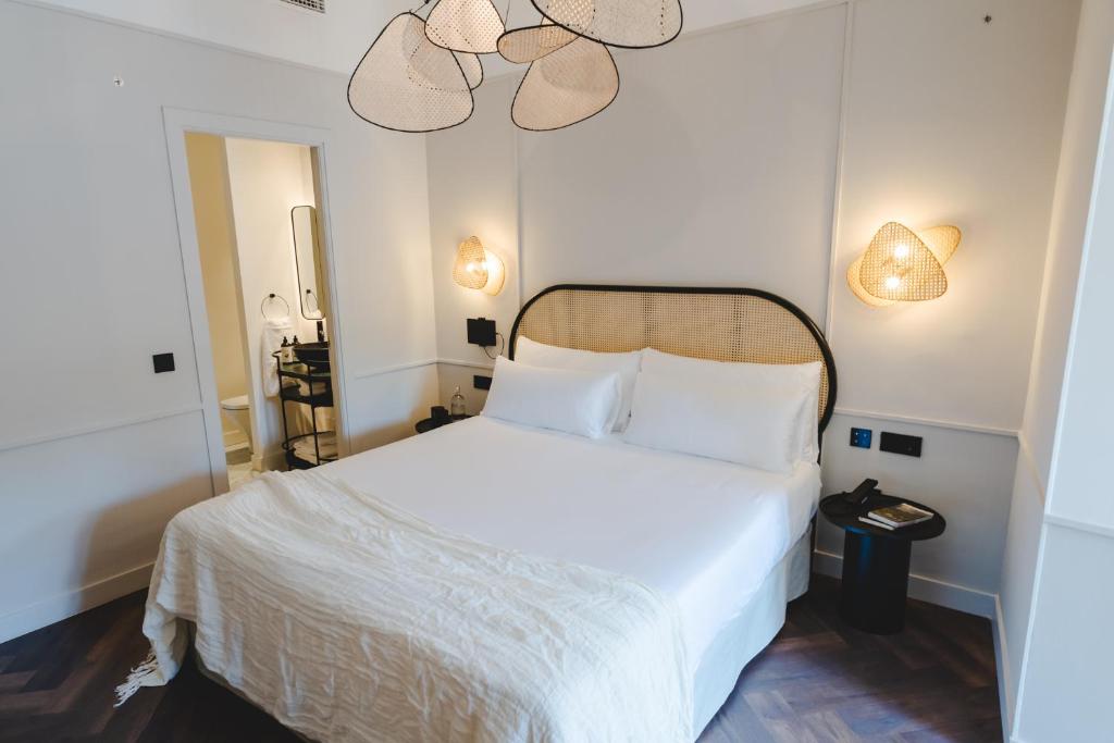 Posteľ alebo postele v izbe v ubytovaní ORA Hotel Priorat, a Member of Design Hotels