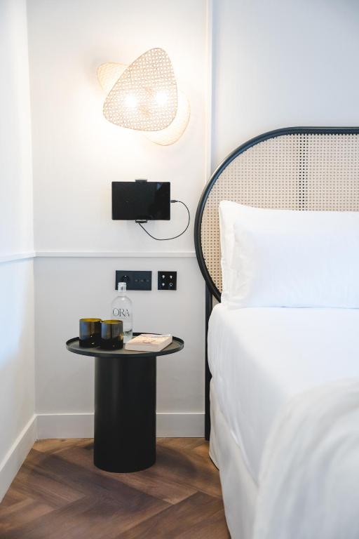 Posteľ alebo postele v izbe v ubytovaní ORA Hotel Priorat, a Member of Design Hotels
