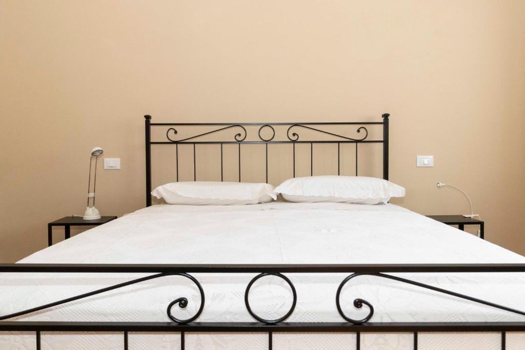 A bed or beds in a room at Angeletti Home