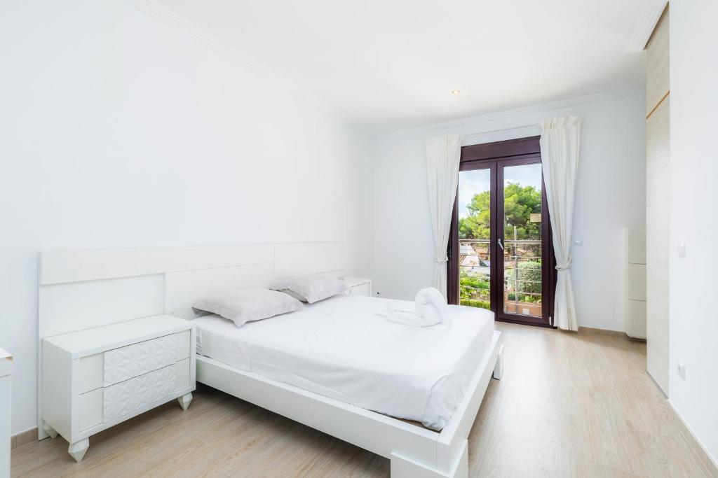 Postel nebo postele na pokoji v ubytování Villa Casa Bon Sol