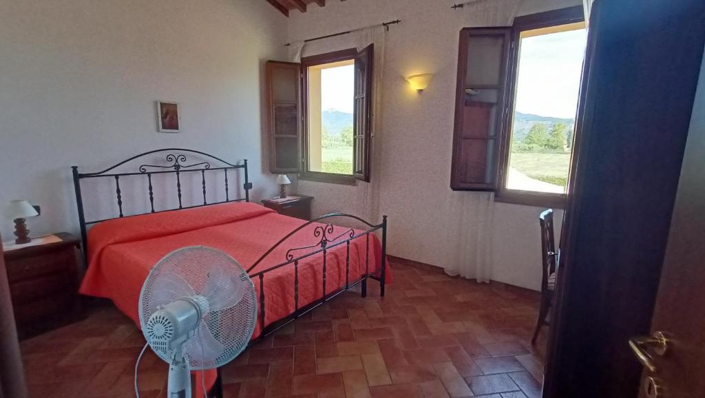 Postel nebo postele na pokoji v ubytování il Chiassetto Agriturismo No Kids